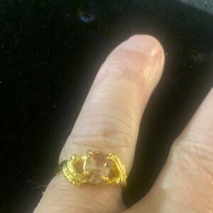 Elegant Gold Ring with Orange Gemstone